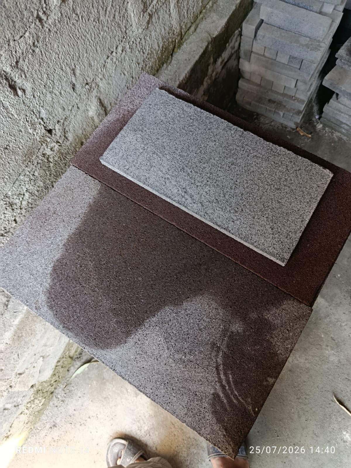 Close view of grey and warm-toned cut lava stone surfaces
